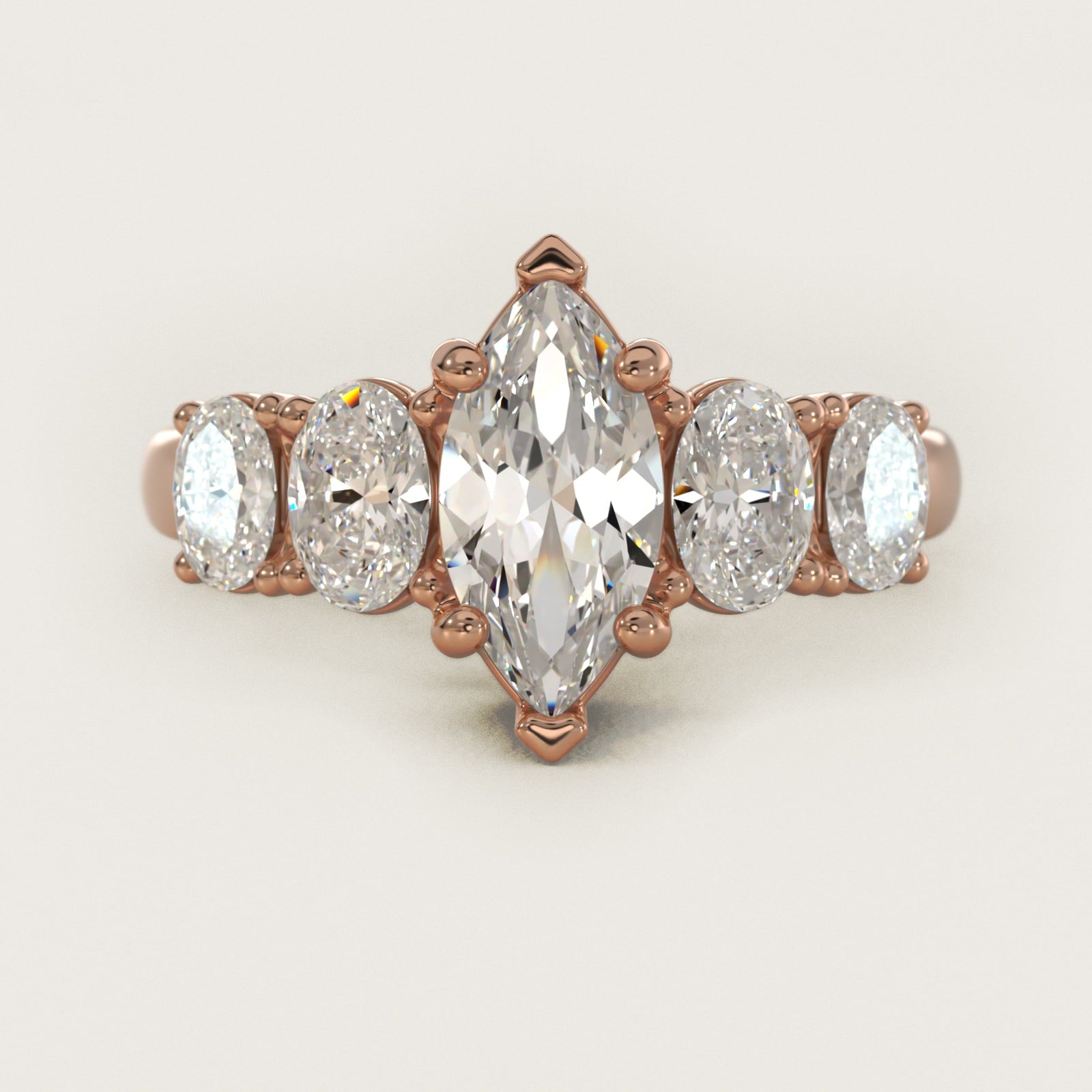 Graduated Oval Diamond Engagement Ring in 14k Rose Gold (1/2 ct. tw.) - Marquise Center