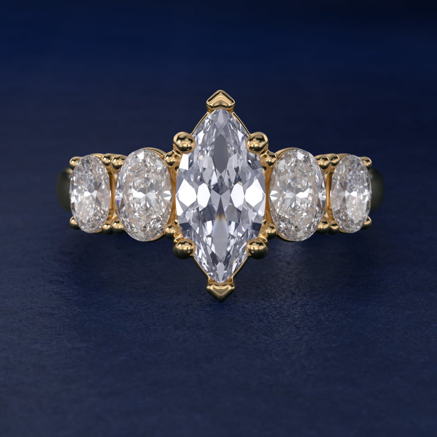Graduated Oval Diamond Engagement Ring in 14K Yellow Gold (1/2 ct. tw.) - Marquise Center