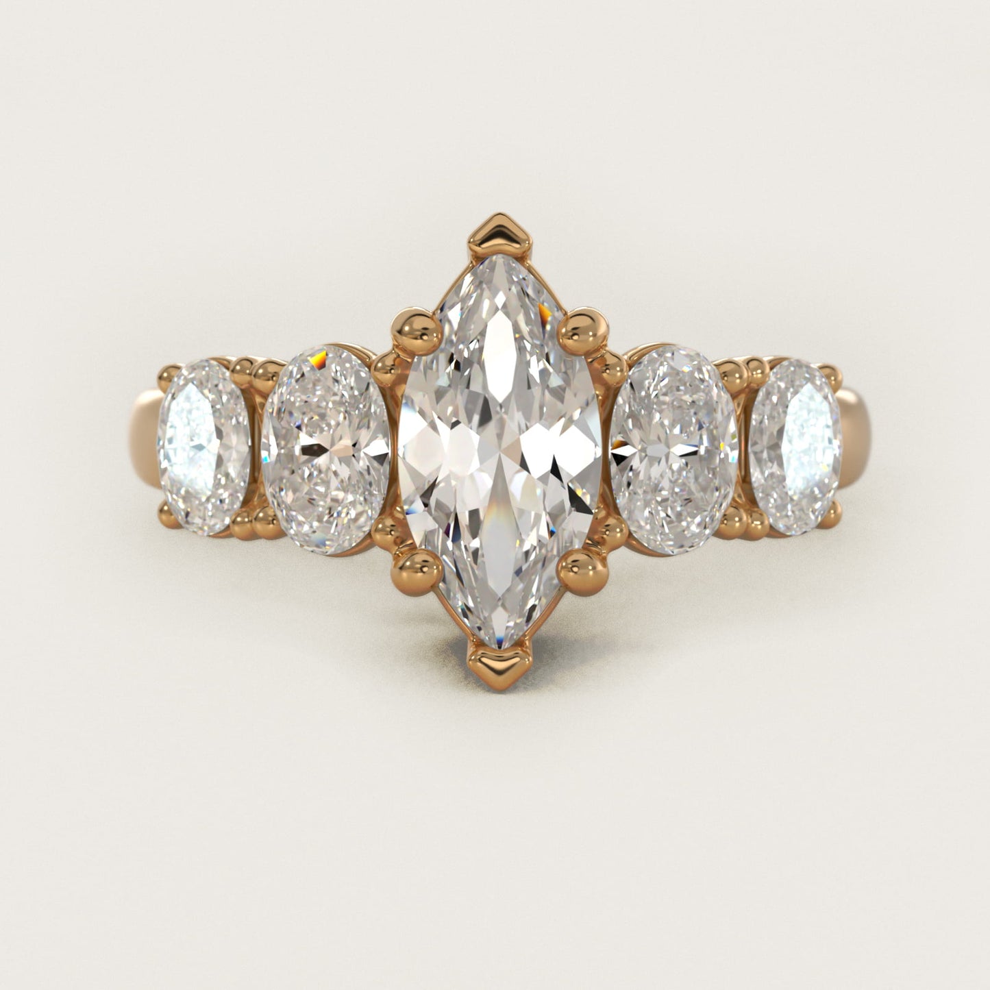 Graduated Oval Diamond Engagement Ring in 14K Yellow Gold (1/2 ct. tw.) - Marquise Center