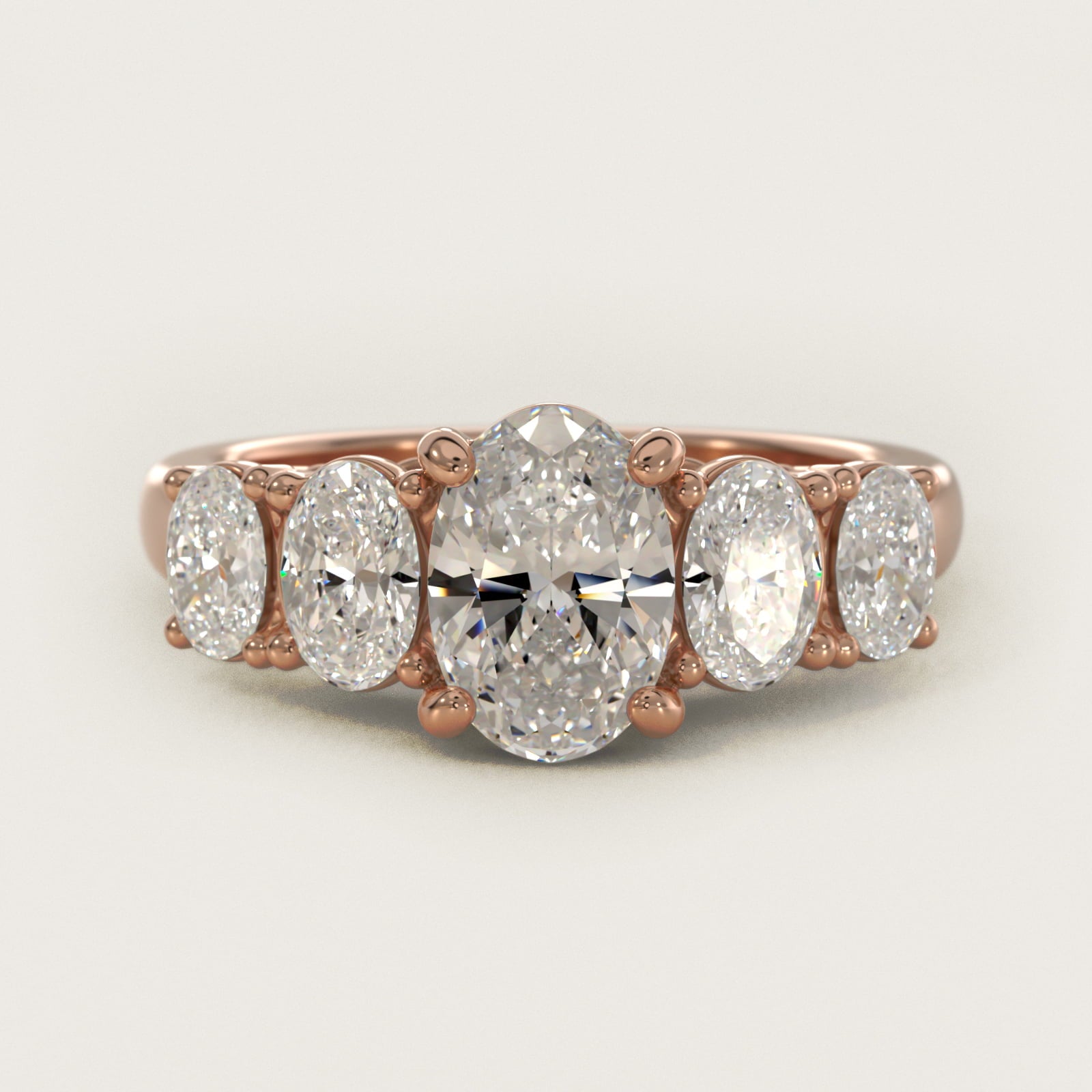 Graduated Oval Diamond Engagement Ring in 14k Rose Gold (1/2 ct. tw.) - Oval Center