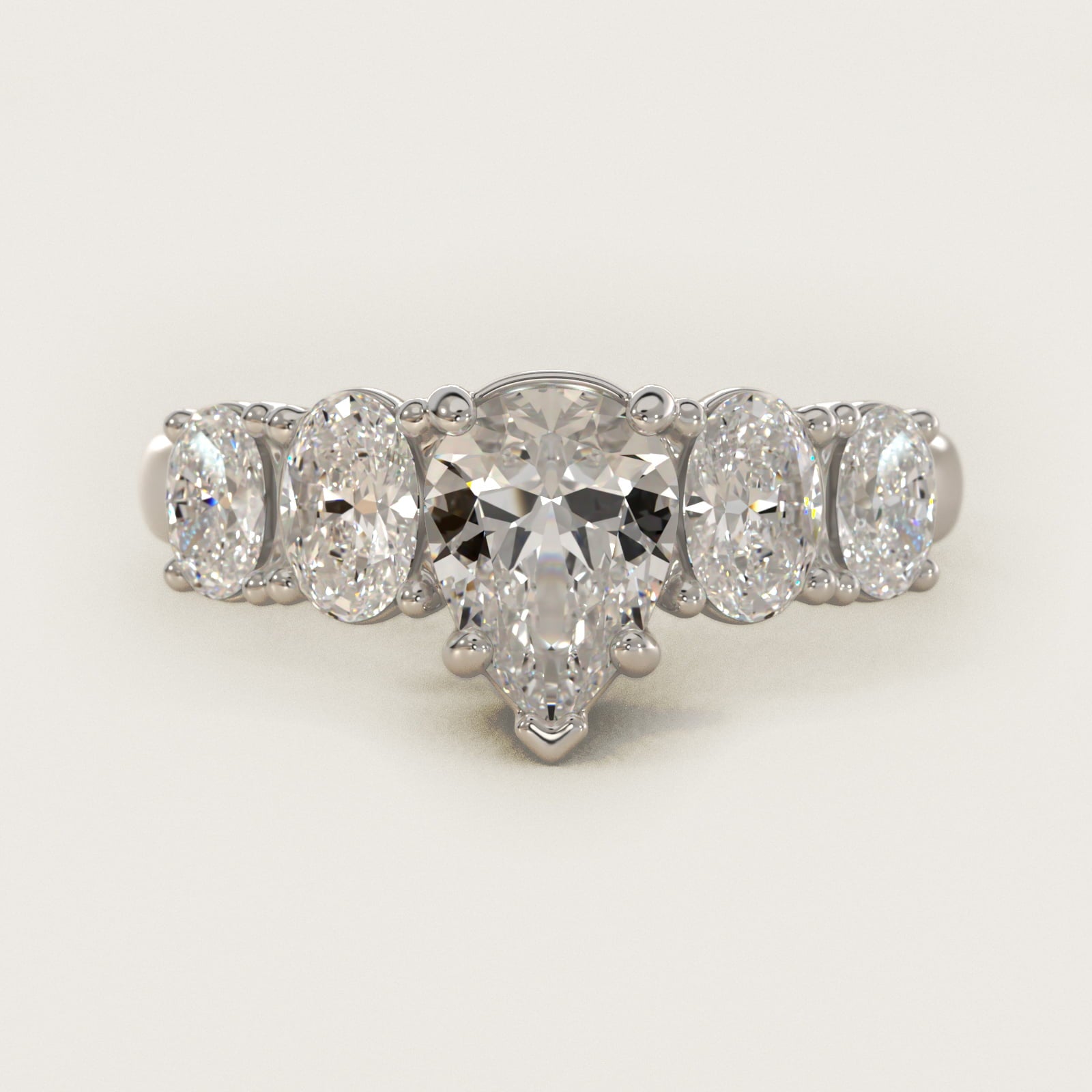 Graduated Oval Diamond Engagement Ring in 14k White Gold (1/2 ct. tw.) - Pear Center