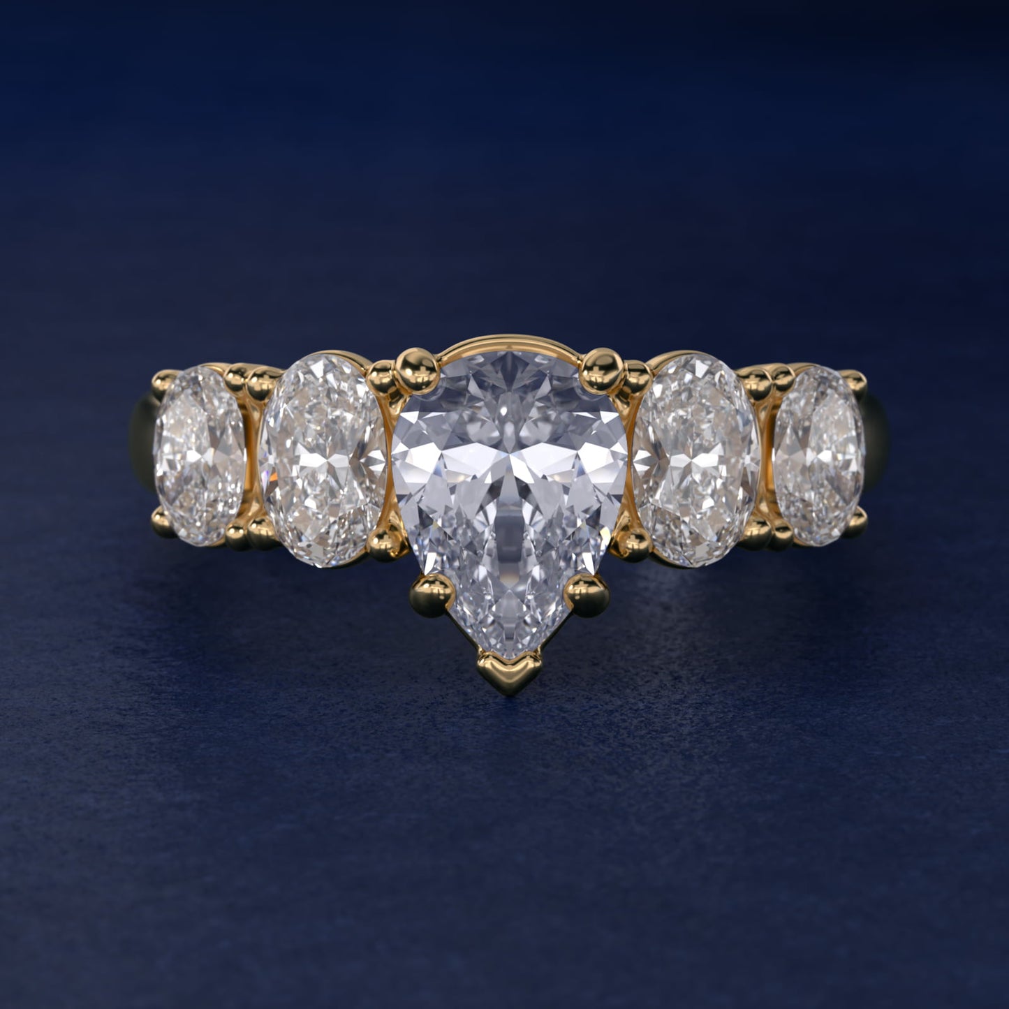 Graduated Oval Diamond Engagement Ring in 14K Yellow Gold (1/2 ct. tw.) - Pear Center
