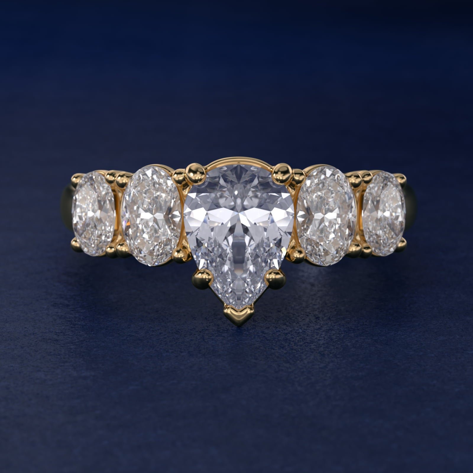 Graduated Oval Diamond Engagement Ring in 14K Yellow Gold (1/2 ct. tw.) - Pear Center