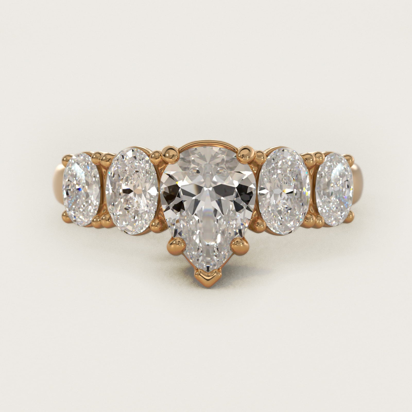 Graduated Oval Diamond Engagement Ring in 14K Yellow Gold (1/2 ct. tw.) - Pear Center