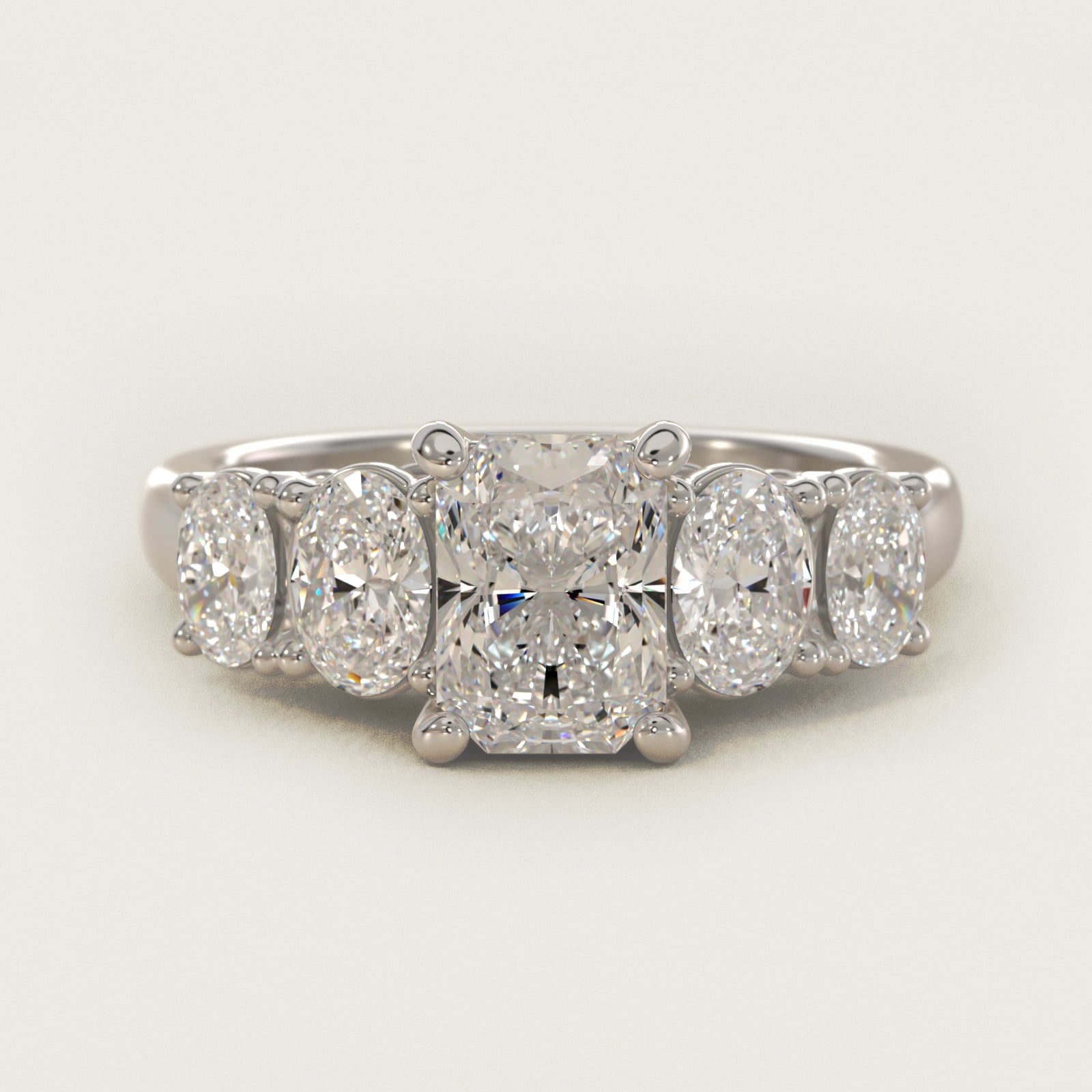 Graduated Oval Diamond Engagement Ring in 14k White Gold (1/2 ct. tw.) - Radiant Center