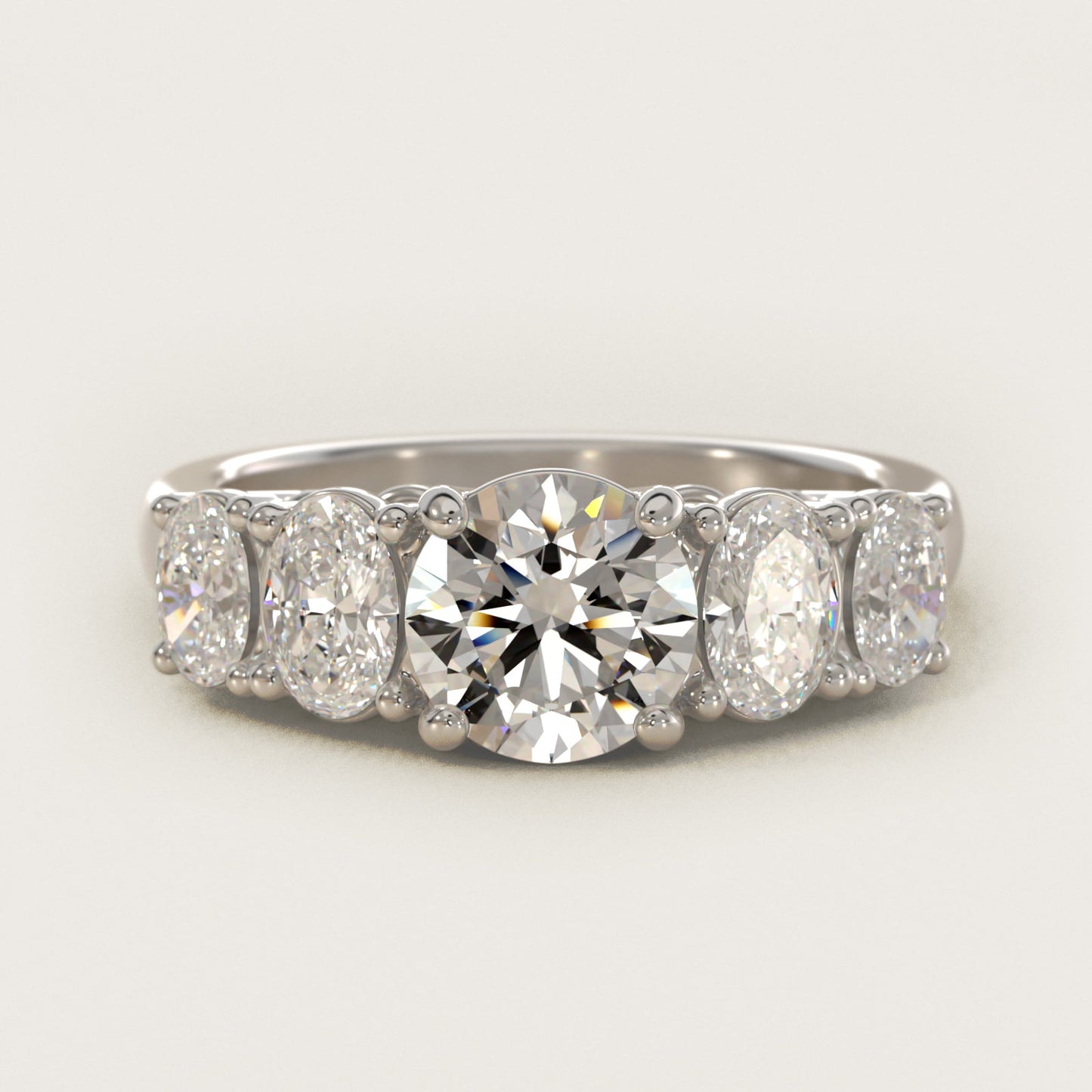 Graduated Oval Diamond Engagement Ring in 14k White Gold (1/2 ct. tw.) - Round Center