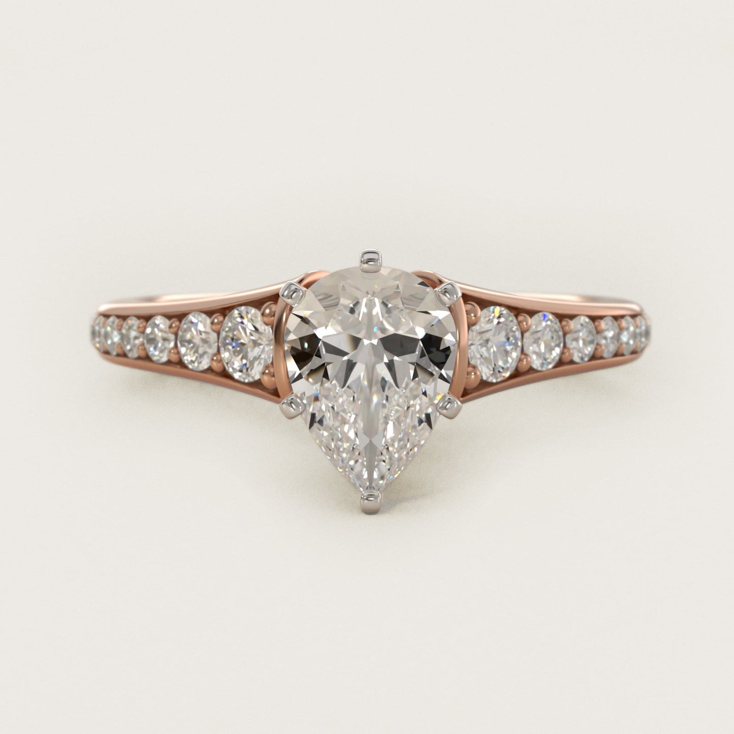 Graduated Diamond Engagement Ring in 14k Rose Gold (1/3 ct. tw.) - Pear Center