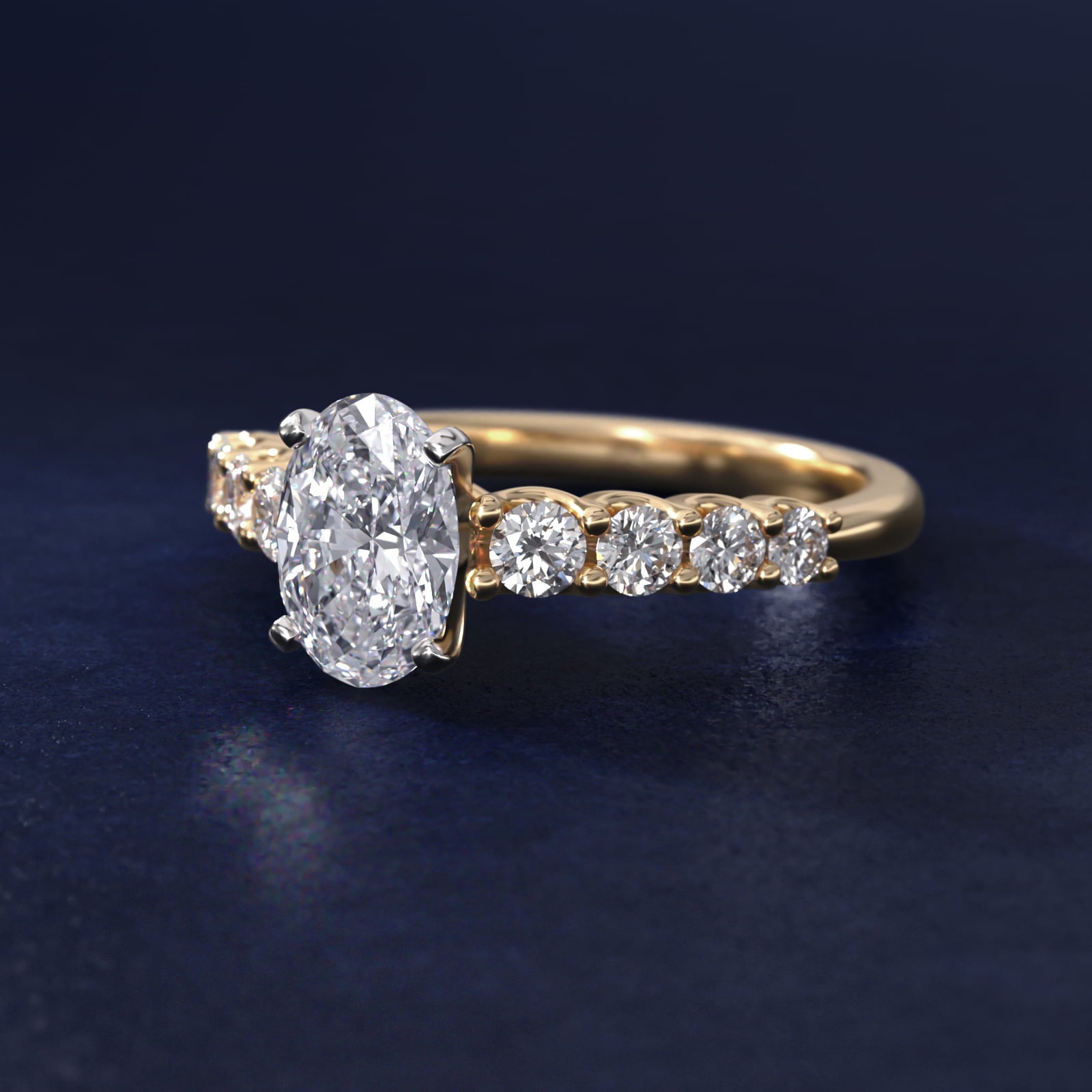 Graduated Side Stone Diamond Engagement Ring in 14K Yellow Gold (3/8 ct. tw.) - Oval Center
