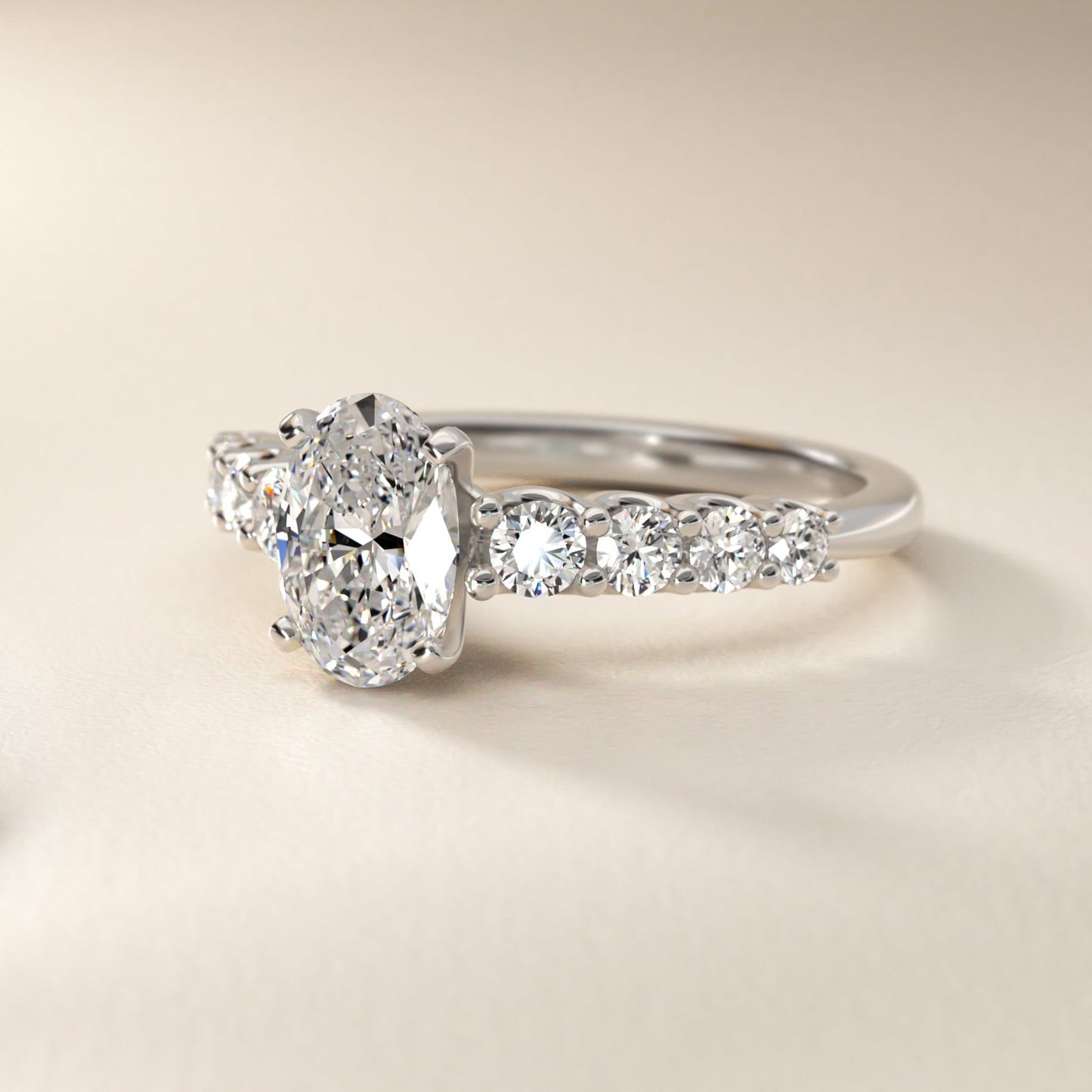 Graduated Side Stone Diamond Engagement Ring in Platinum (3/8 ct. tw.) - Oval Center