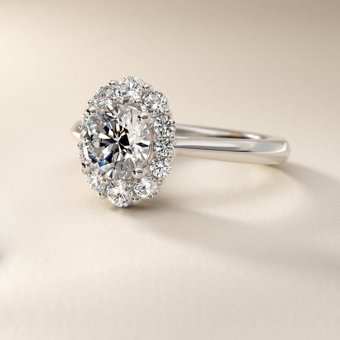 Knife Edge Graduated Oval Diamond Halo Engagement Ring in 18k White Gold (1/3 ct. tw.) - Round Center