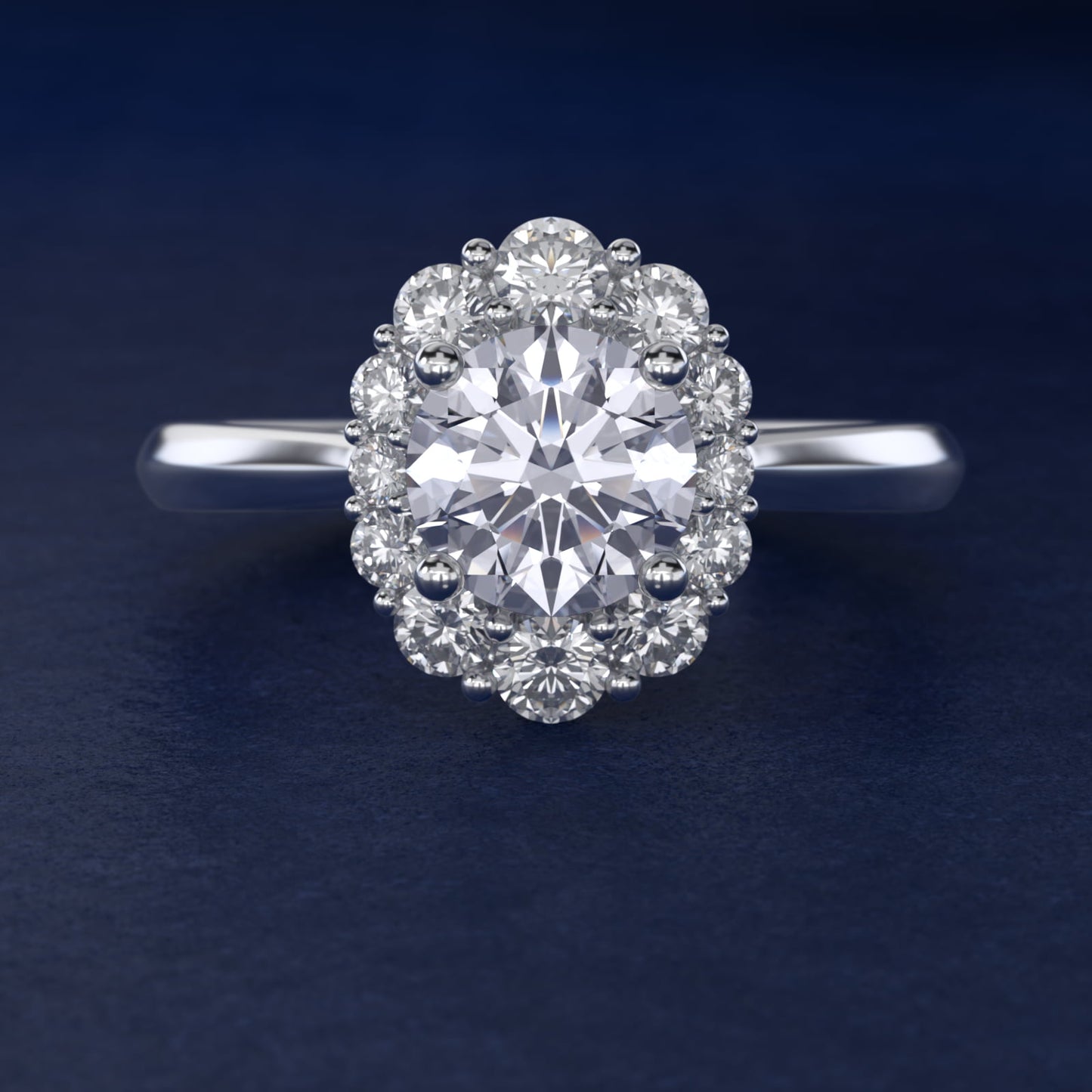 Knife Edge Graduated Oval Diamond Halo Engagement Ring in Platinum (1/3 ct. tw.) - Round Center
