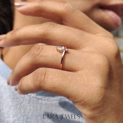 Lab grown round engagement ring in Pear and Round Diamond, available in Silver. IGI certified, ethically sourced, handcrafted at Lara Jewels.