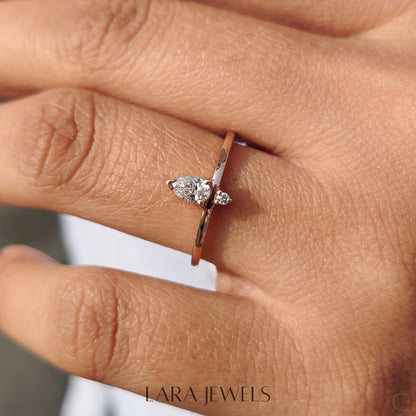 Lab grown round engagement ring in Pear and Round Diamond, available in Silver. IGI certified, ethically sourced, handcrafted at Lara Jewels.