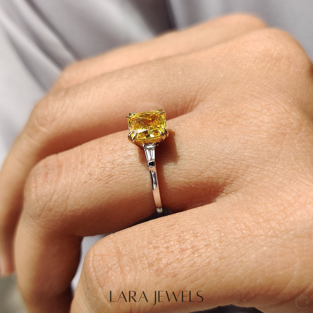 Lab grown cushion engagement ring in Cushion & Baguette, available in Silver. IGI certified, ethically sourced, handcrafted at Lara Jewels.