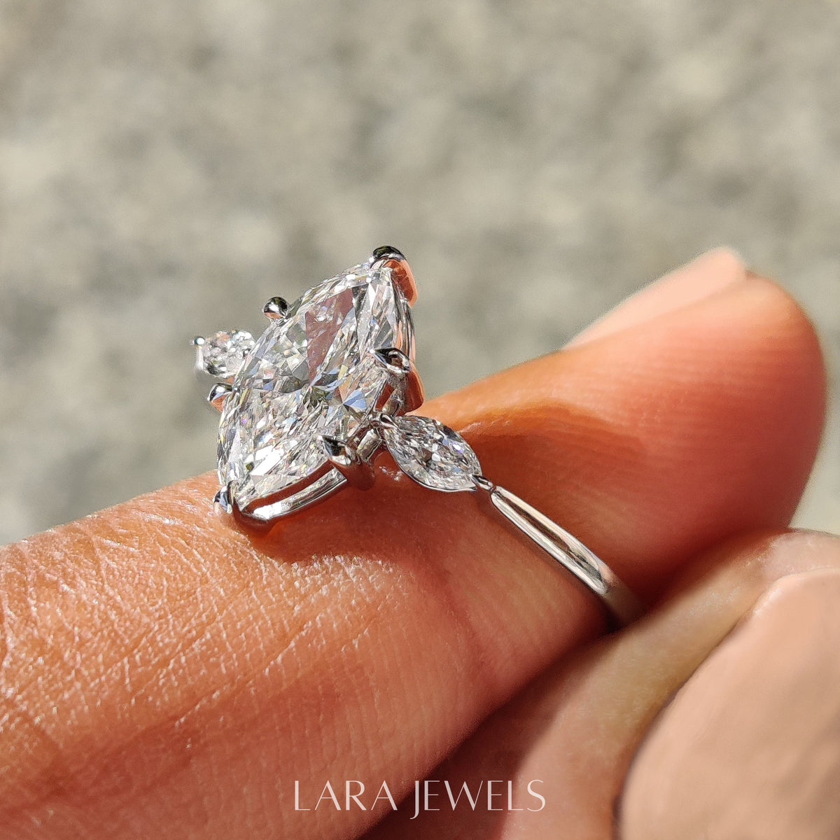Lab grown marquise engagement ring in Yellow Gold, available in Silver. IGI certified, ethically sourced, handcrafted at Lara Jewels.