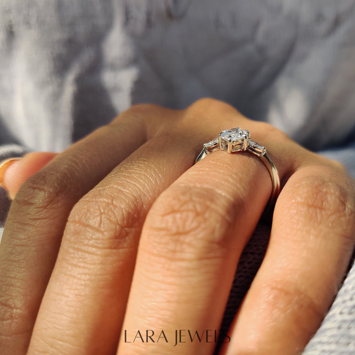 Lab grown marquise engagement ring in Yellow Gold, available in Silver. IGI certified, ethically sourced, handcrafted at Lara Jewels.
