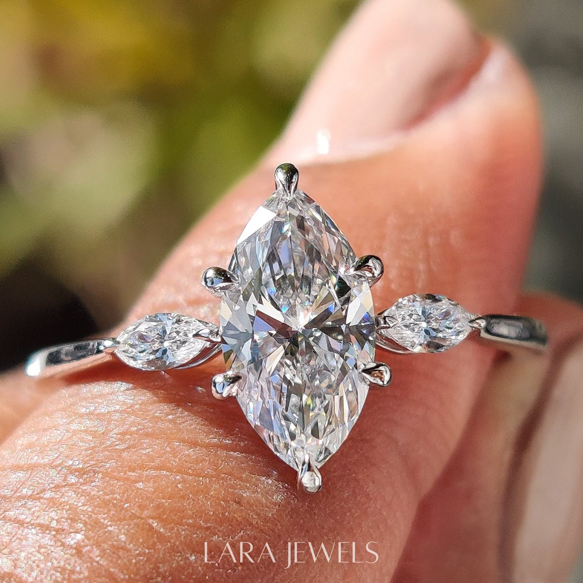Lab grown marquise engagement ring in Yellow Gold, available in Silver. IGI certified, ethically sourced, handcrafted at Lara Jewels.