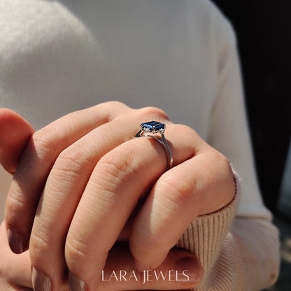 Lab grown emerald engagement ring in Lara Jewels setting, available in Silver. IGI certified, ethically sourced, handcrafted at Lara Jewels.