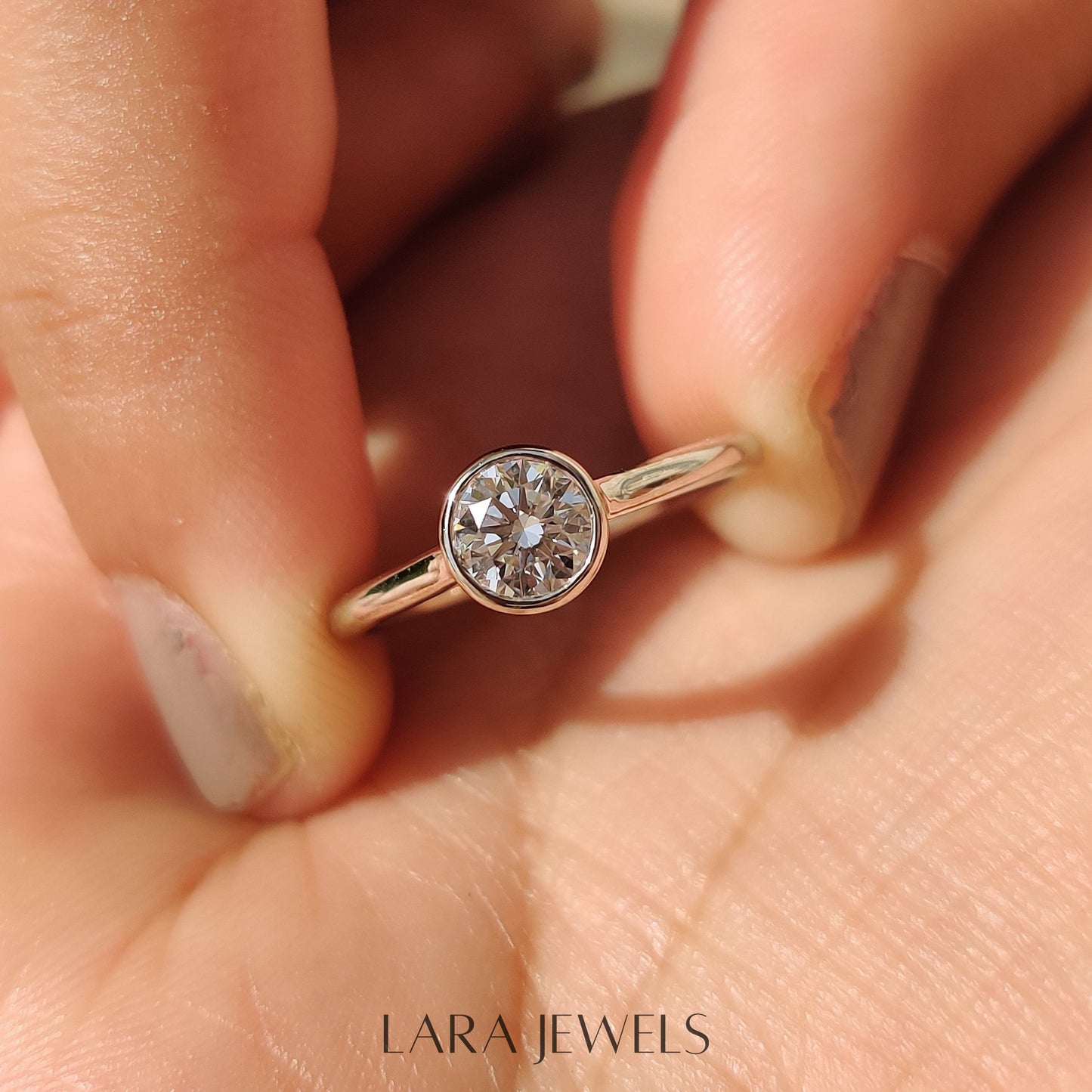 Lab grown round engagement ring in White Gold, available in Silver. IGI certified, ethically sourced, handcrafted at Lara Jewels.