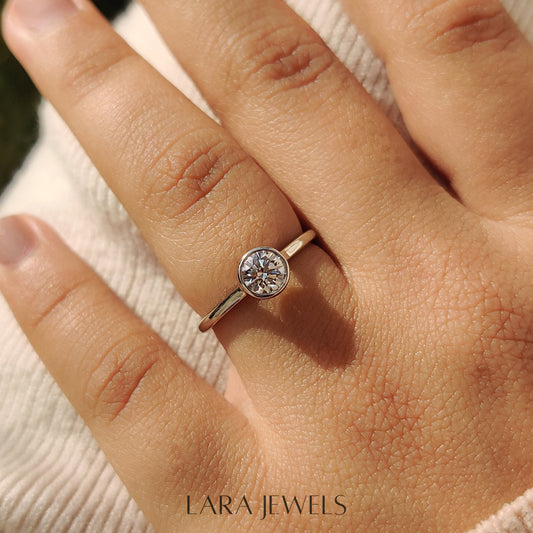 Lab grown round engagement ring in White Gold, available in Silver. IGI certified, ethically sourced, handcrafted at Lara Jewels.