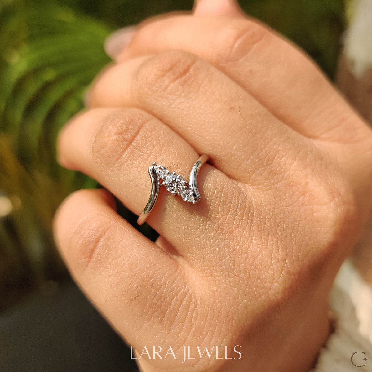 Lab grown round engagement ring in Round And Pear Diamond, available in Silver. IGI certified, ethically sourced, handcrafted at Lara Jewels.