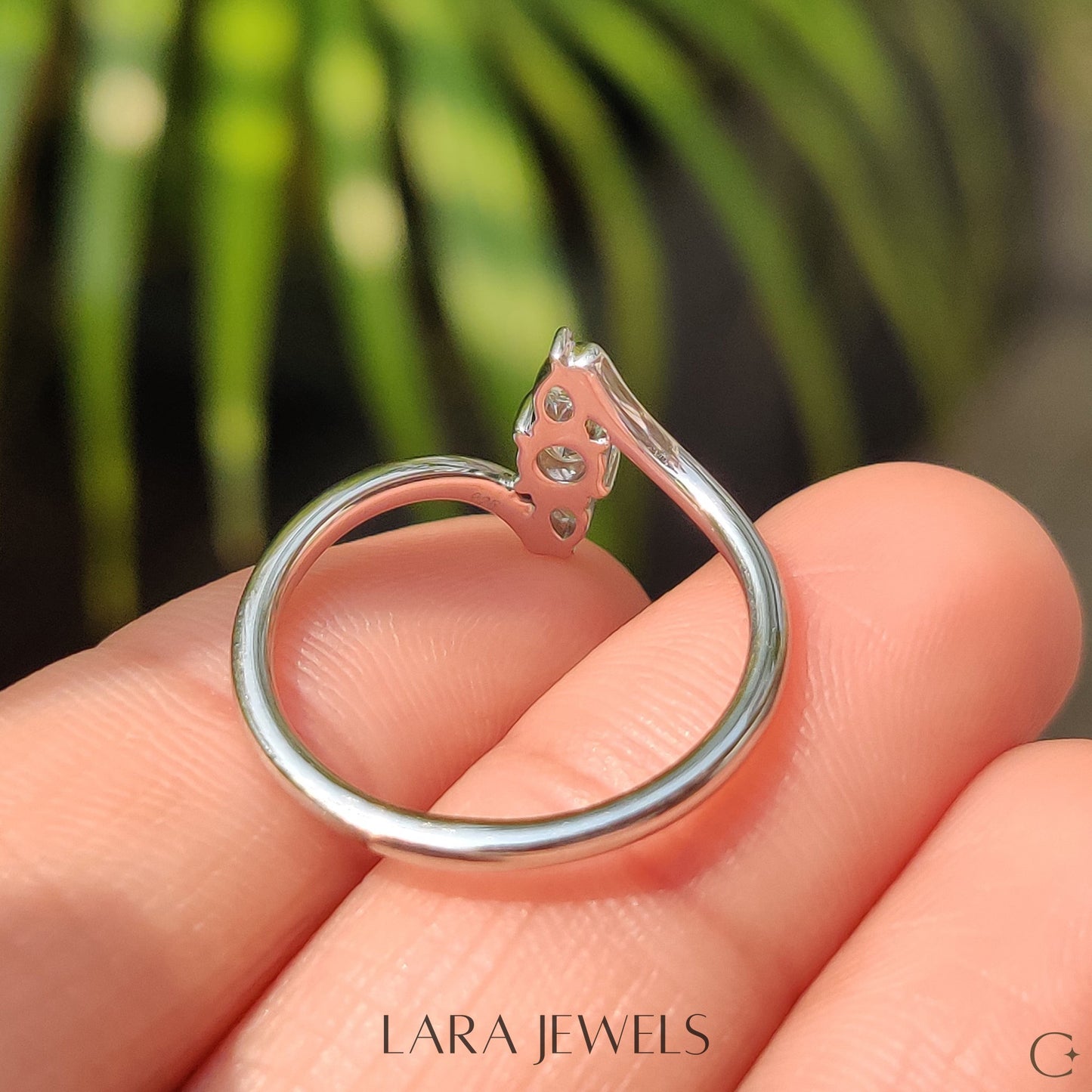 Lab grown round engagement ring in Round And Pear Diamond, available in Silver. IGI certified, ethically sourced, handcrafted at Lara Jewels.