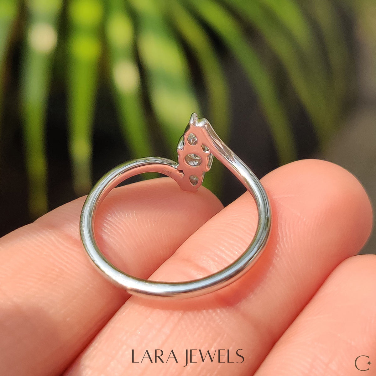 Lab grown round engagement ring in Round And Pear Diamond, available in Silver. IGI certified, ethically sourced, handcrafted at Lara Jewels.