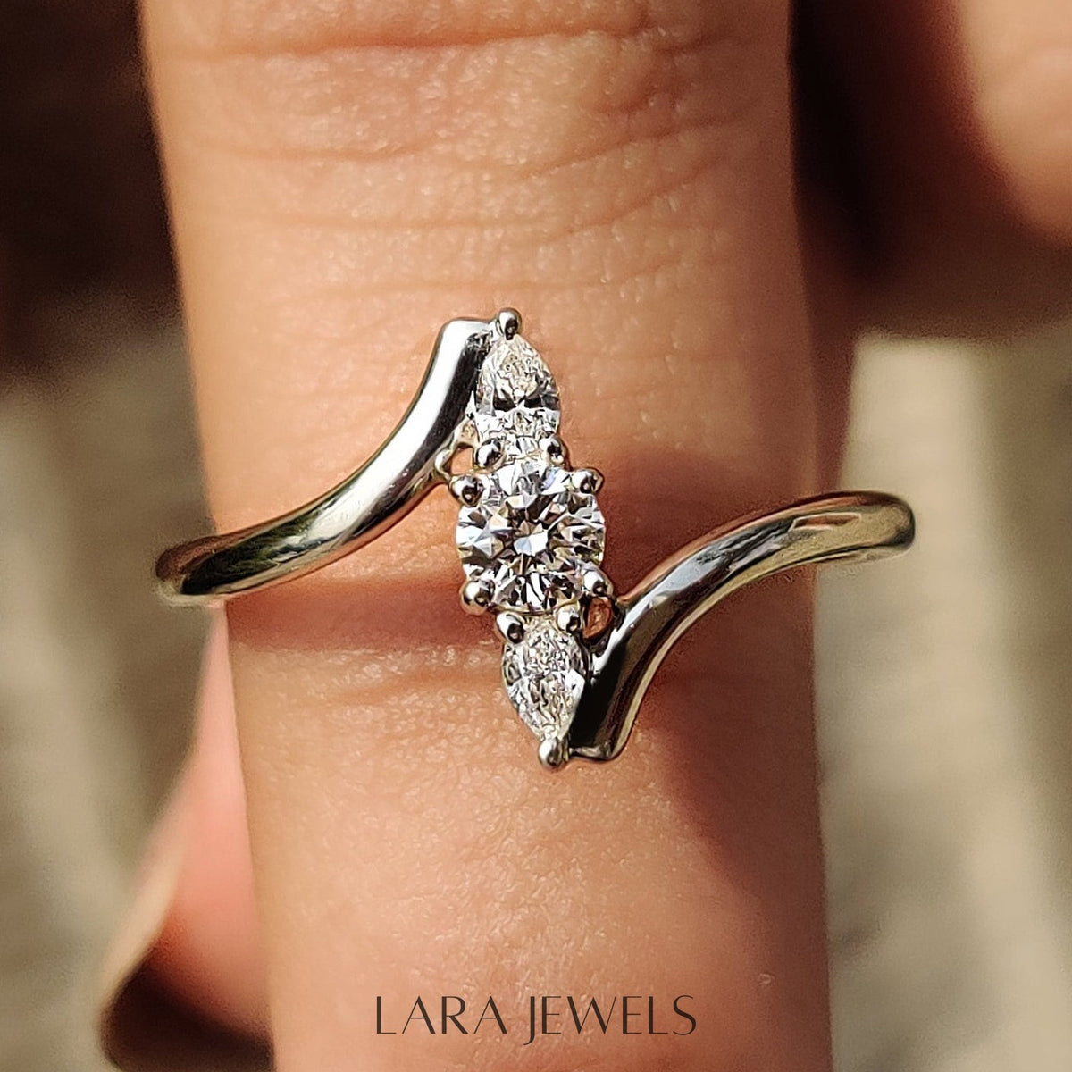 Lab grown round engagement ring in Round And Pear Diamond, available in Silver. IGI certified, ethically sourced, handcrafted at Lara Jewels.
