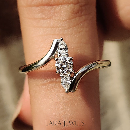 Lab grown round engagement ring in Round And Pear Diamond, available in Silver. IGI certified, ethically sourced, handcrafted at Lara Jewels.