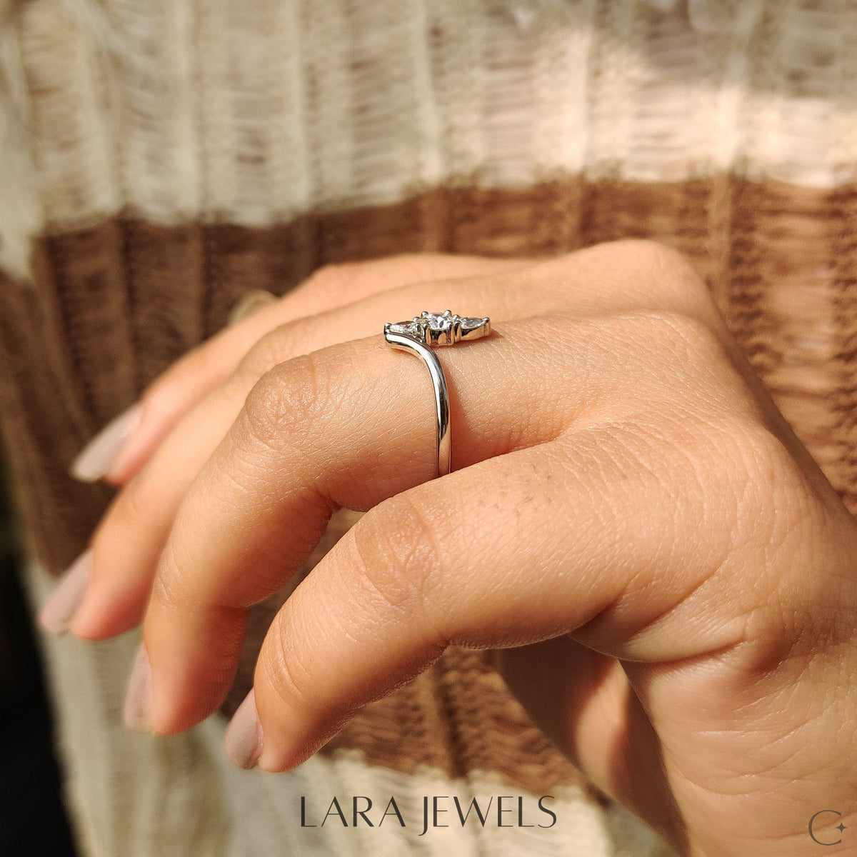 Lab grown round engagement ring in Round And Pear Diamond, available in Silver. IGI certified, ethically sourced, handcrafted at Lara Jewels.