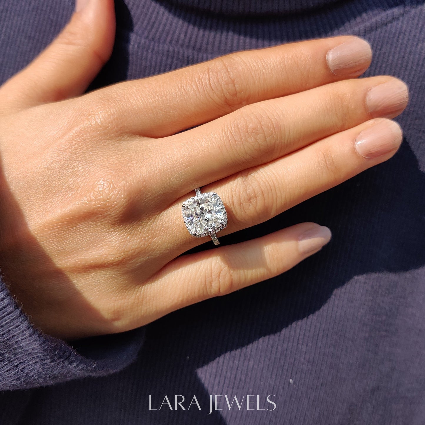 Lab grown cushion engagement ring in Halo Style, available in Silver. IGI certified, ethically sourced, handcrafted at Lara Jewels.
