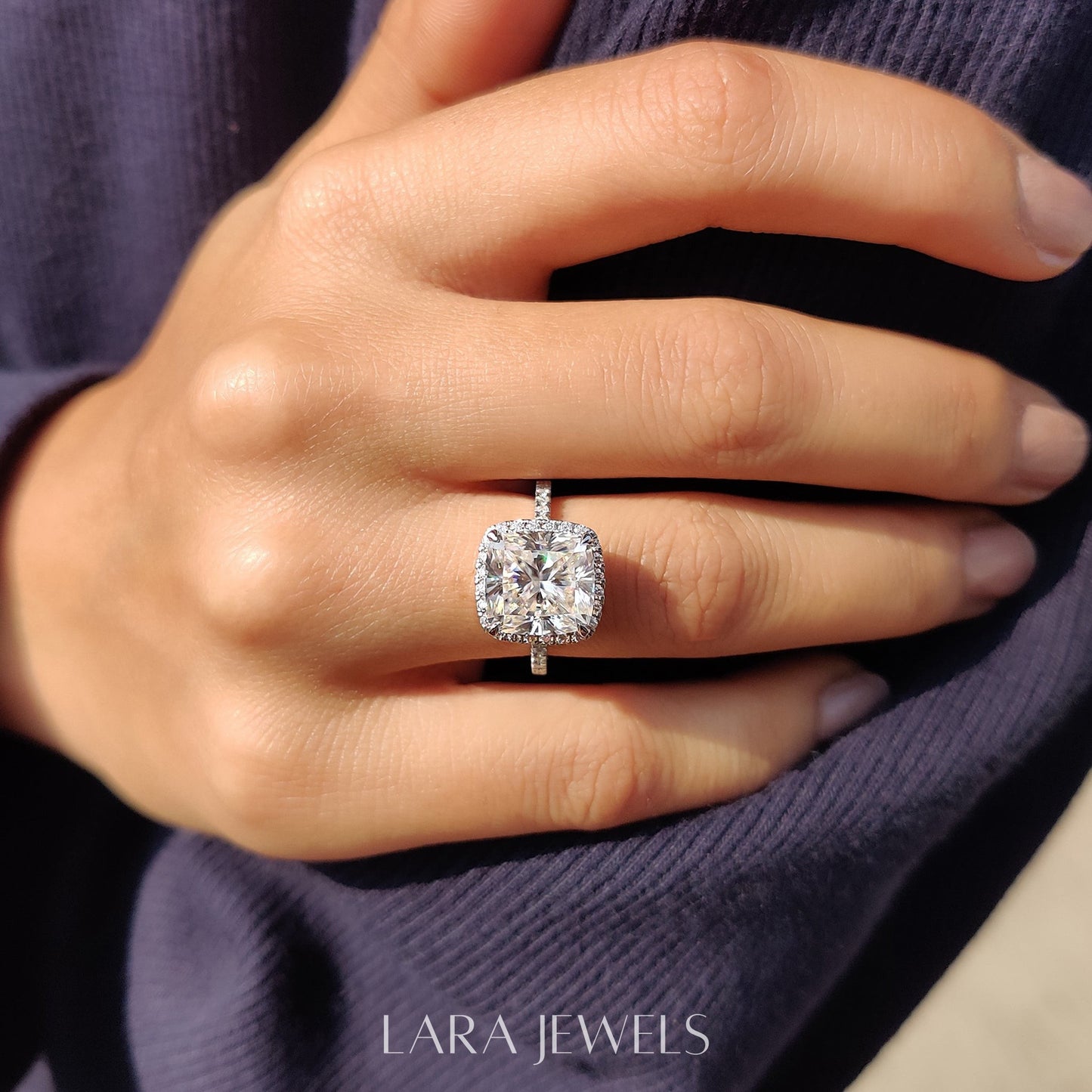 Lab grown cushion engagement ring in Halo Style, available in Silver. IGI certified, ethically sourced, handcrafted at Lara Jewels.