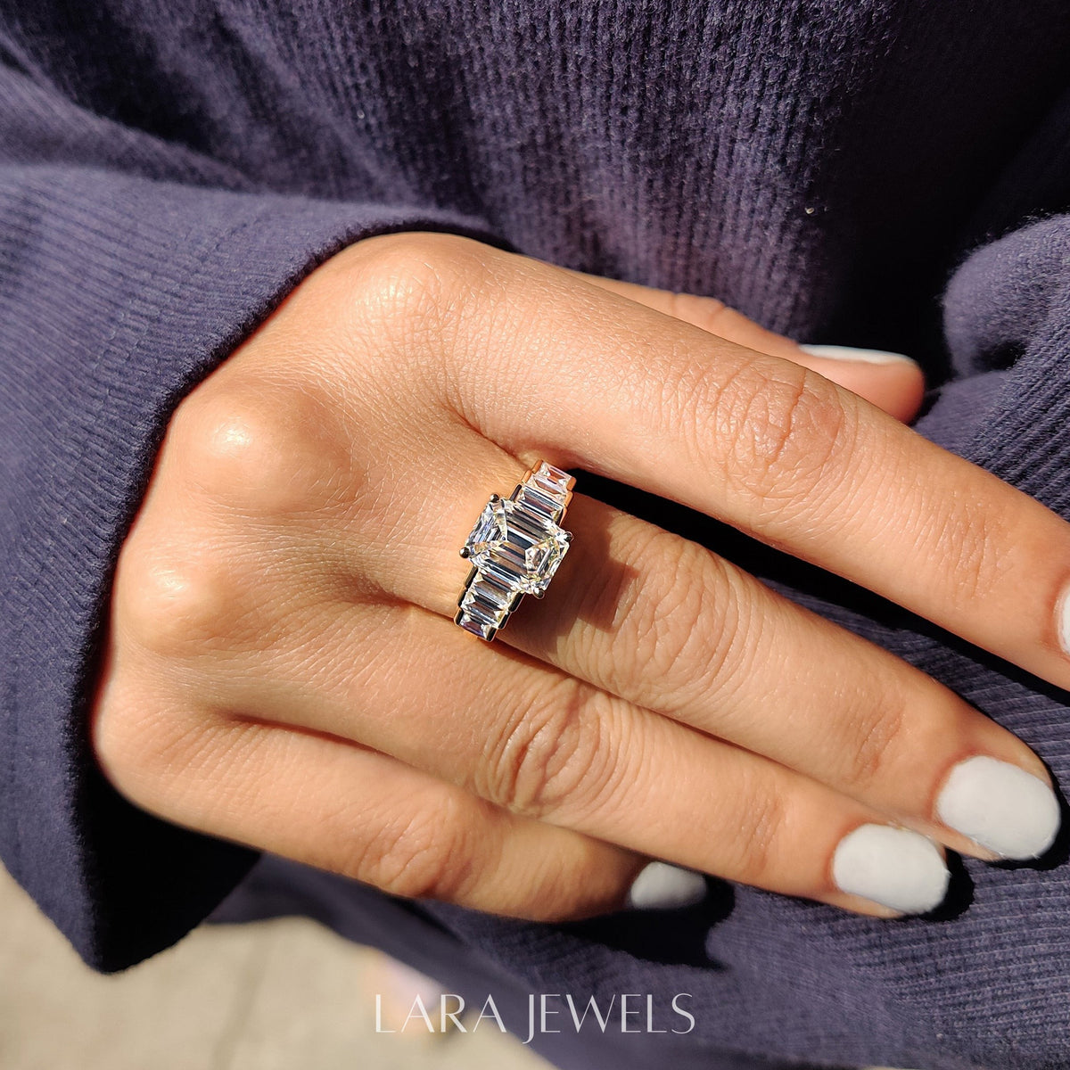 Lab grown emerald engagement ring in Lara Jewels setting, available in Silver. IGI certified, ethically sourced, handcrafted at Lara Jewels.