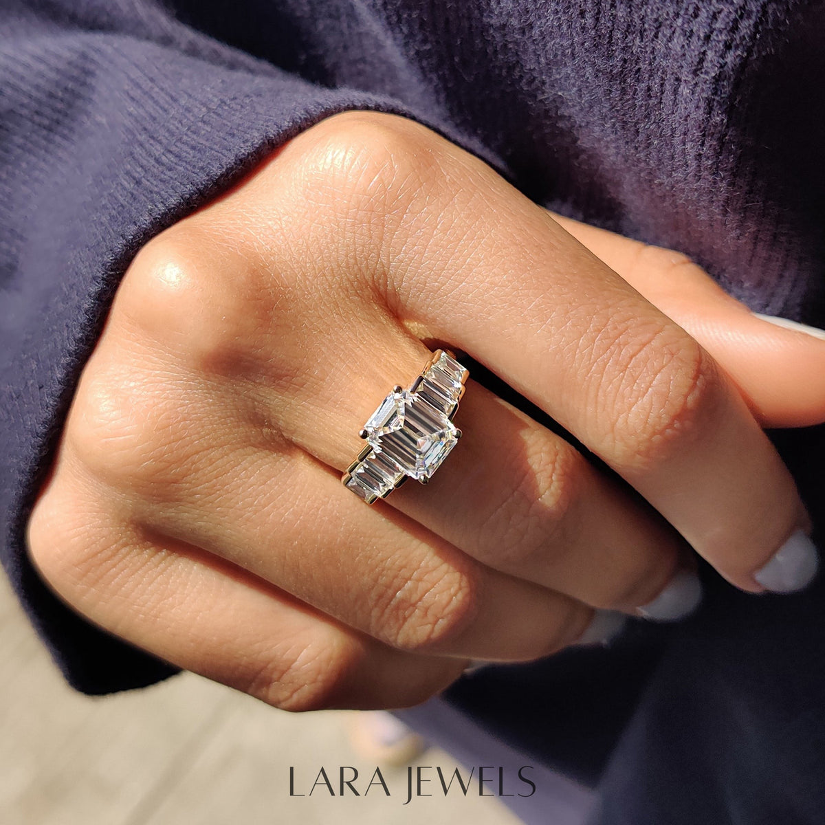 Lab grown emerald engagement ring in Lara Jewels setting, available in Silver. IGI certified, ethically sourced, handcrafted at Lara Jewels.