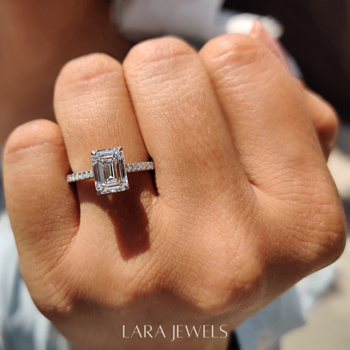 Lab grown emerald engagement ring in Lara Jewels setting, available in Silver. IGI certified, ethically sourced, handcrafted at Lara Jewels.