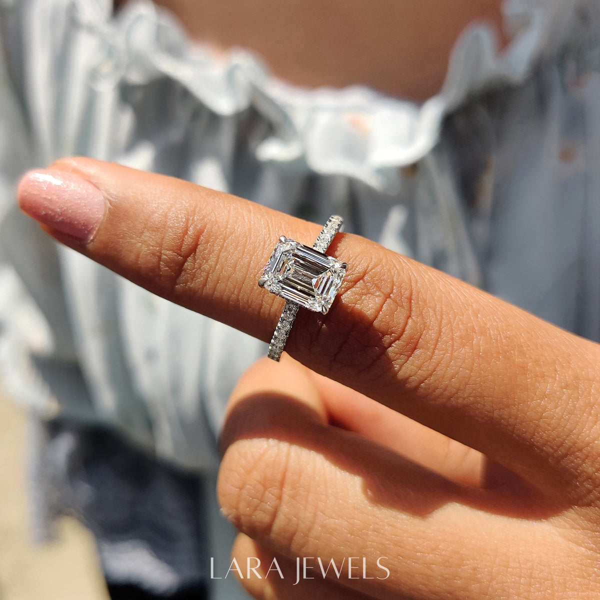 Lab grown emerald engagement ring in Lara Jewels setting, available in Silver. IGI certified, ethically sourced, handcrafted at Lara Jewels.