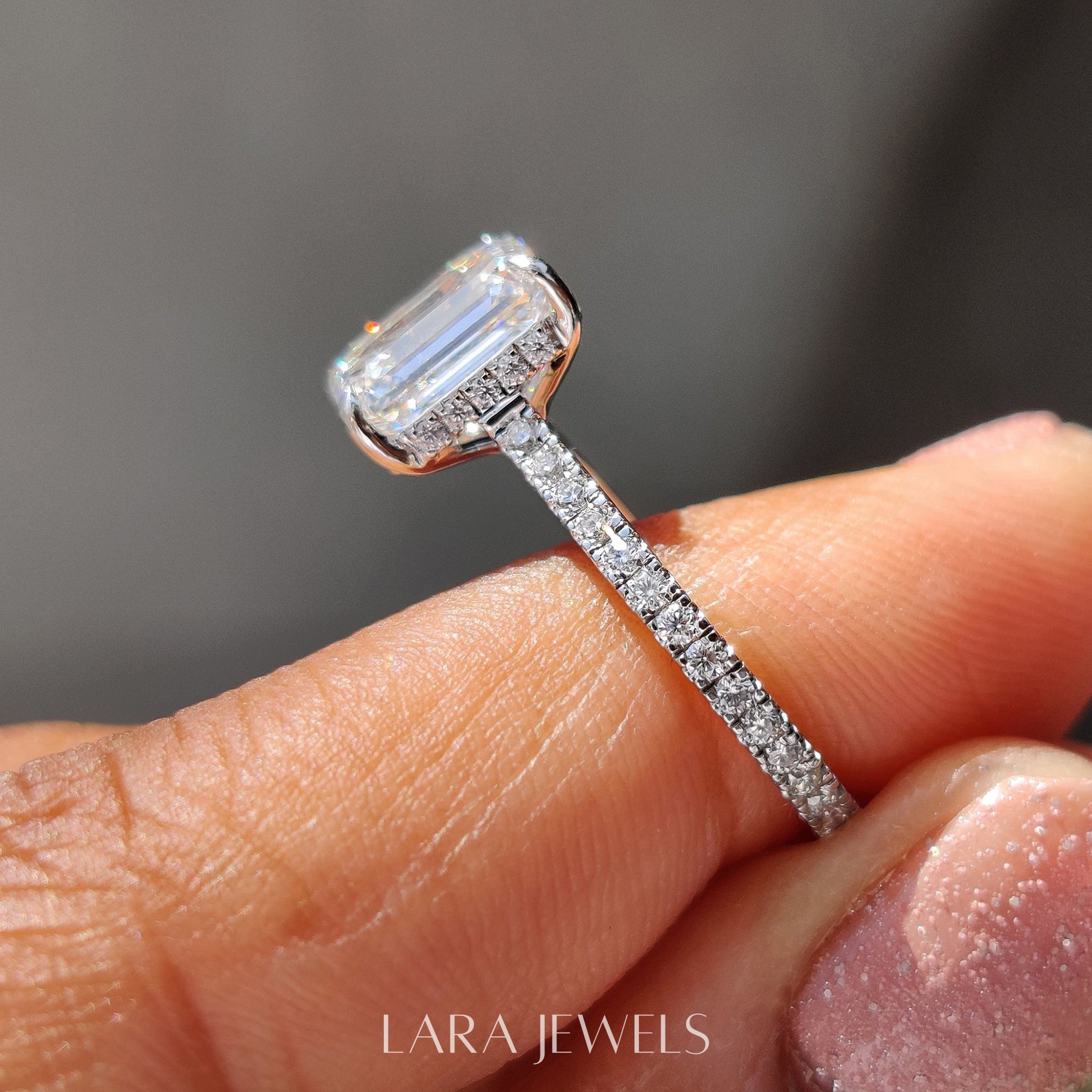 Lab grown emerald engagement ring in Lara Jewels setting, available in Silver. IGI certified, ethically sourced, handcrafted at Lara Jewels.