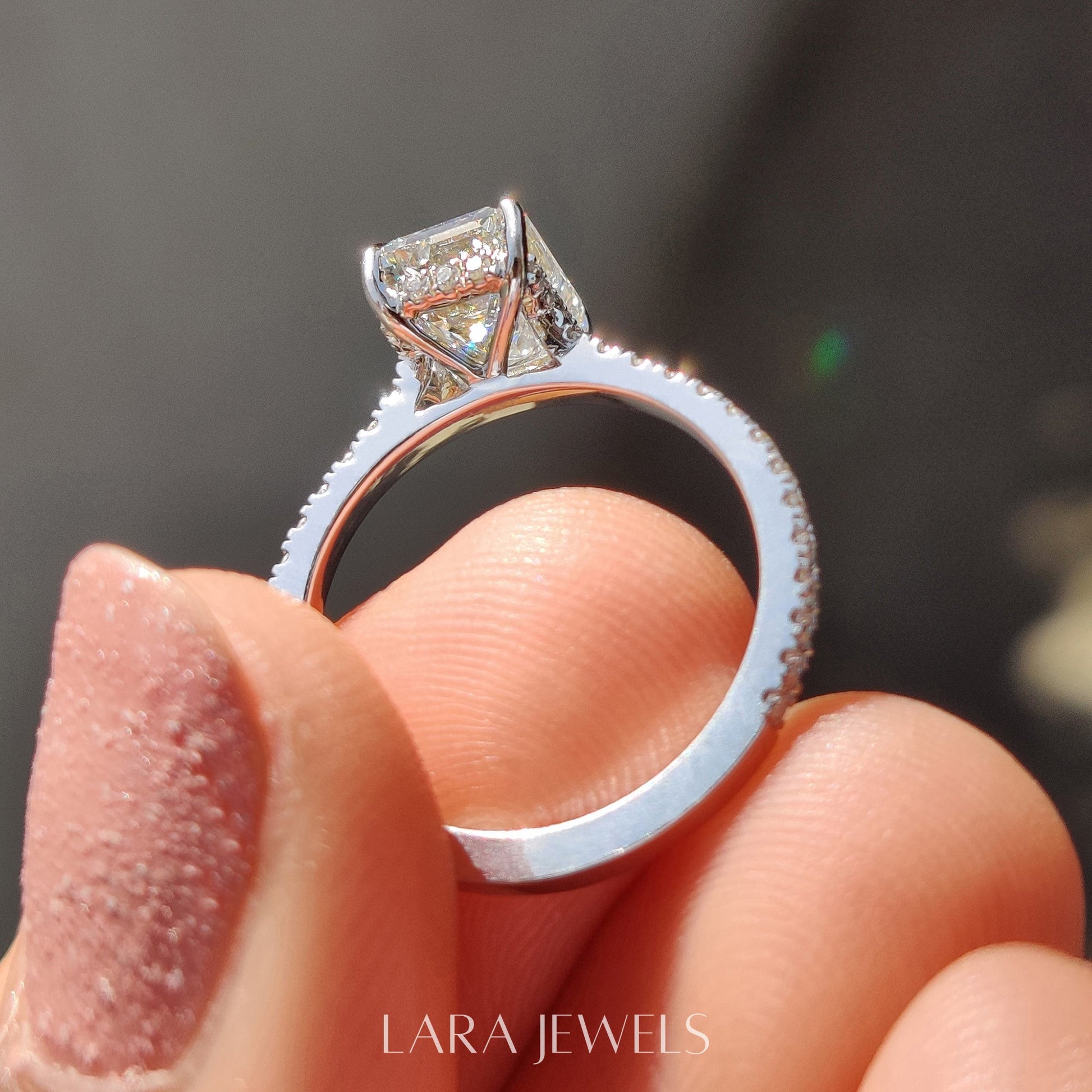 Lab grown emerald engagement ring in Lara Jewels setting, available in Silver. IGI certified, ethically sourced, handcrafted at Lara Jewels.