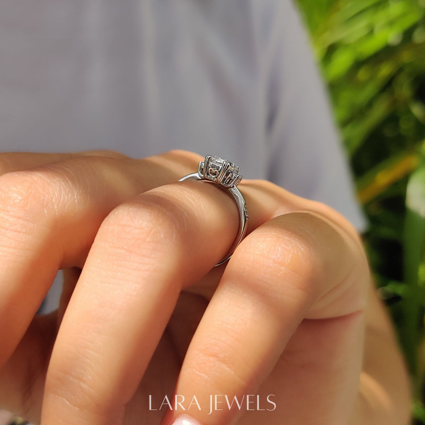 Lab grown emerald engagement ring in Lara Jewels setting, available in Silver. IGI certified, ethically sourced, handcrafted at Lara Jewels.