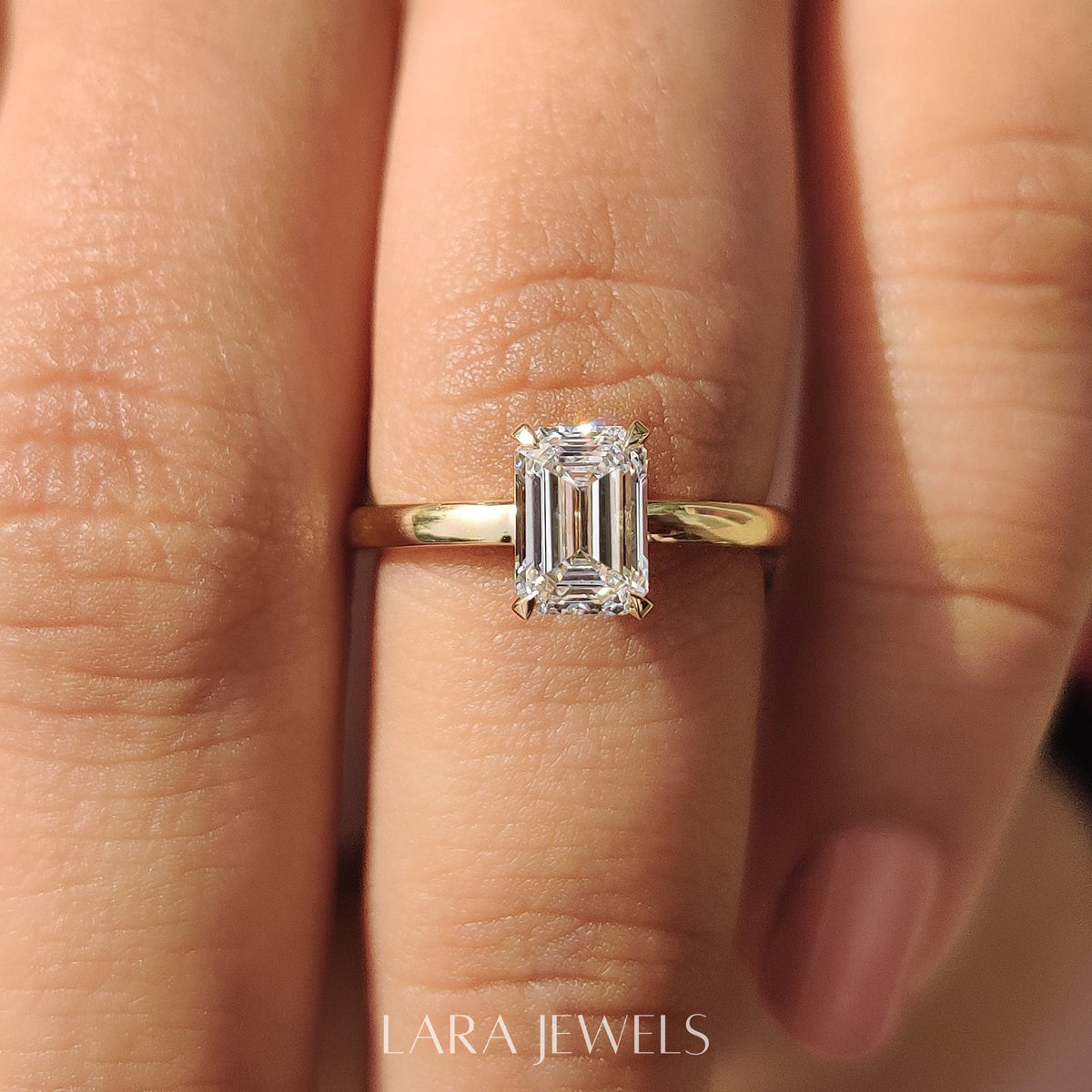 Lab grown emerald engagement ring in Basket Design, available in Silver. IGI certified, ethically sourced, handcrafted at Lara Jewels.
