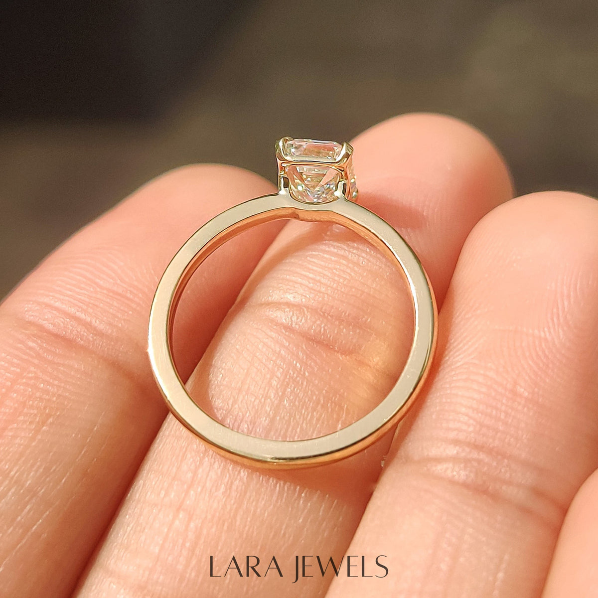 Lab grown emerald engagement ring in Basket Design, available in Silver. IGI certified, ethically sourced, handcrafted at Lara Jewels.