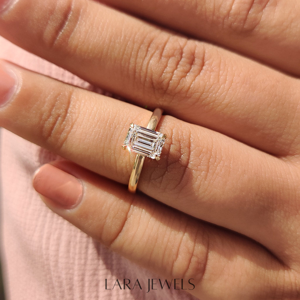 Lab grown emerald engagement ring in Basket Design, available in Silver. IGI certified, ethically sourced, handcrafted at Lara Jewels.