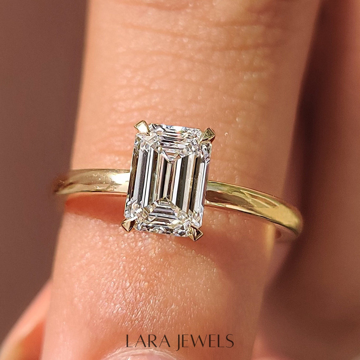 Lab grown emerald engagement ring in Basket Design, available in Silver. IGI certified, ethically sourced, handcrafted at Lara Jewels.