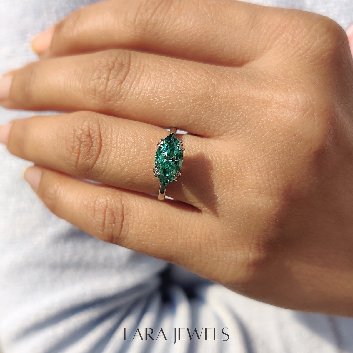 Lab grown marquise engagement ring in Solitaire Style, available in Silver. IGI certified, ethically sourced, handcrafted at Lara Jewels.