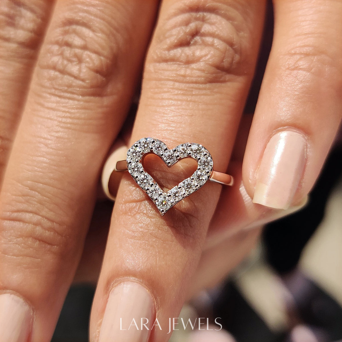 Lab grown round engagement ring in Round Cut Moissanite, available in Silver. IGI certified, ethically sourced, handcrafted at Lara Jewels.