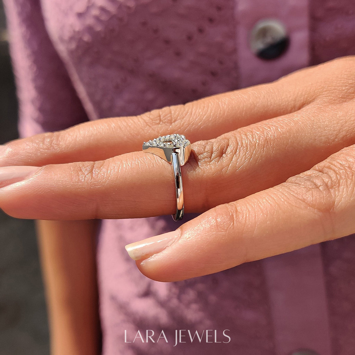Lab grown round engagement ring in Round Cut Moissanite, available in Silver. IGI certified, ethically sourced, handcrafted at Lara Jewels.