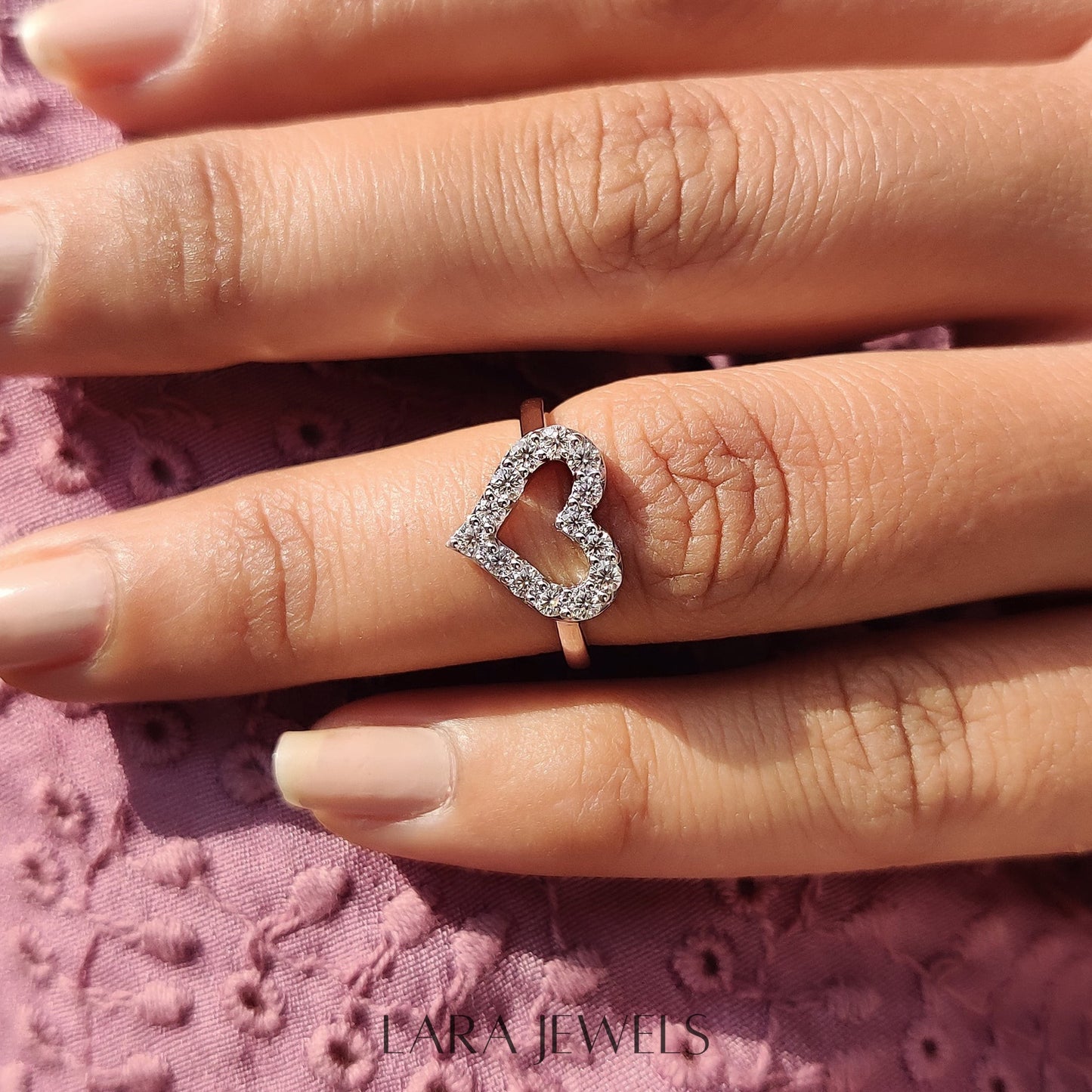 Lab grown round engagement ring in Round Cut Moissanite, available in Silver. IGI certified, ethically sourced, handcrafted at Lara Jewels.