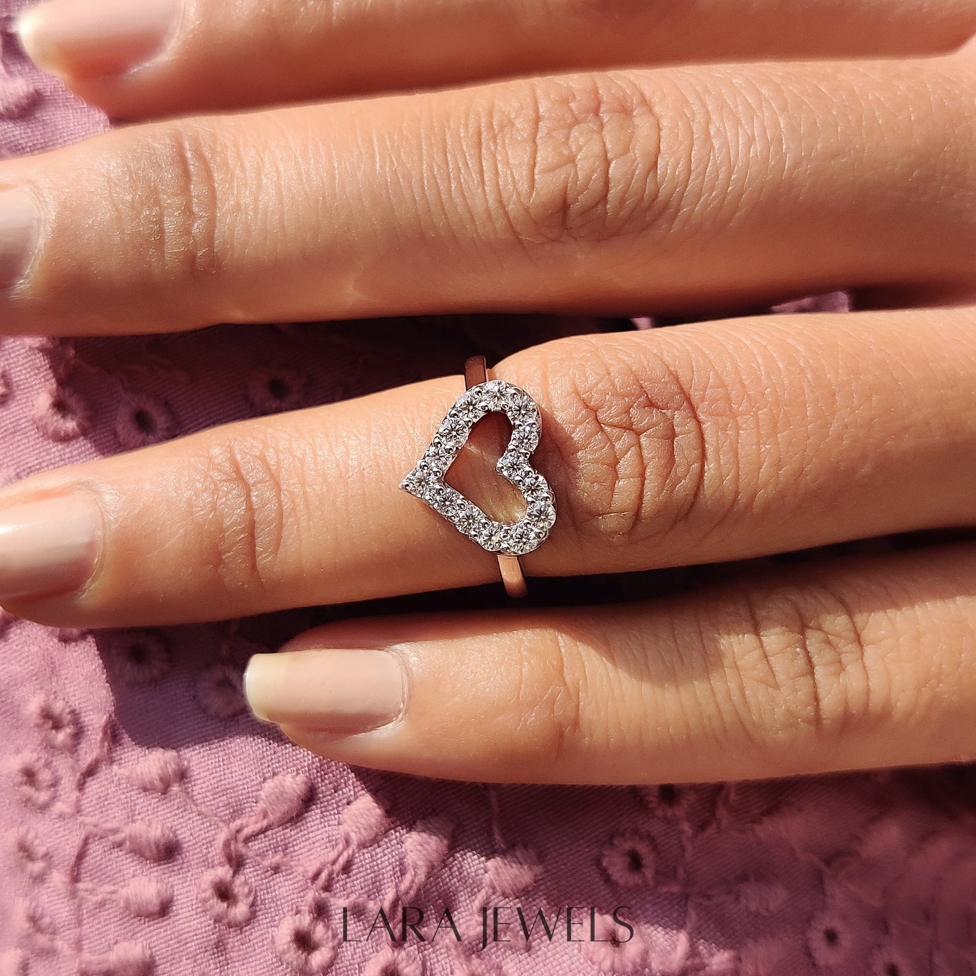 Lab grown round engagement ring in Round Cut Moissanite, available in Silver. IGI certified, ethically sourced, handcrafted at Lara Jewels.
