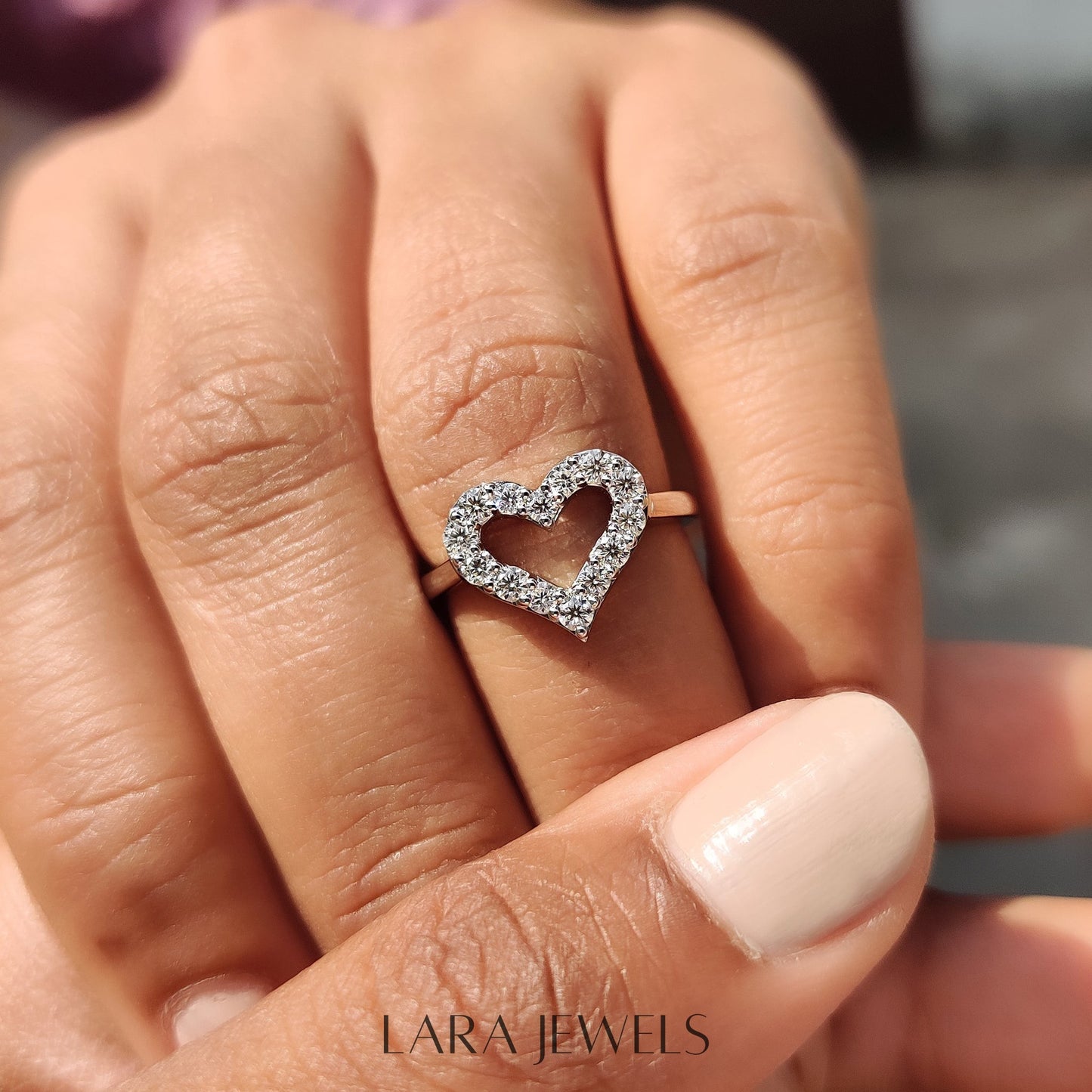 Lab grown round engagement ring in Round Cut Moissanite, available in Silver. IGI certified, ethically sourced, handcrafted at Lara Jewels.