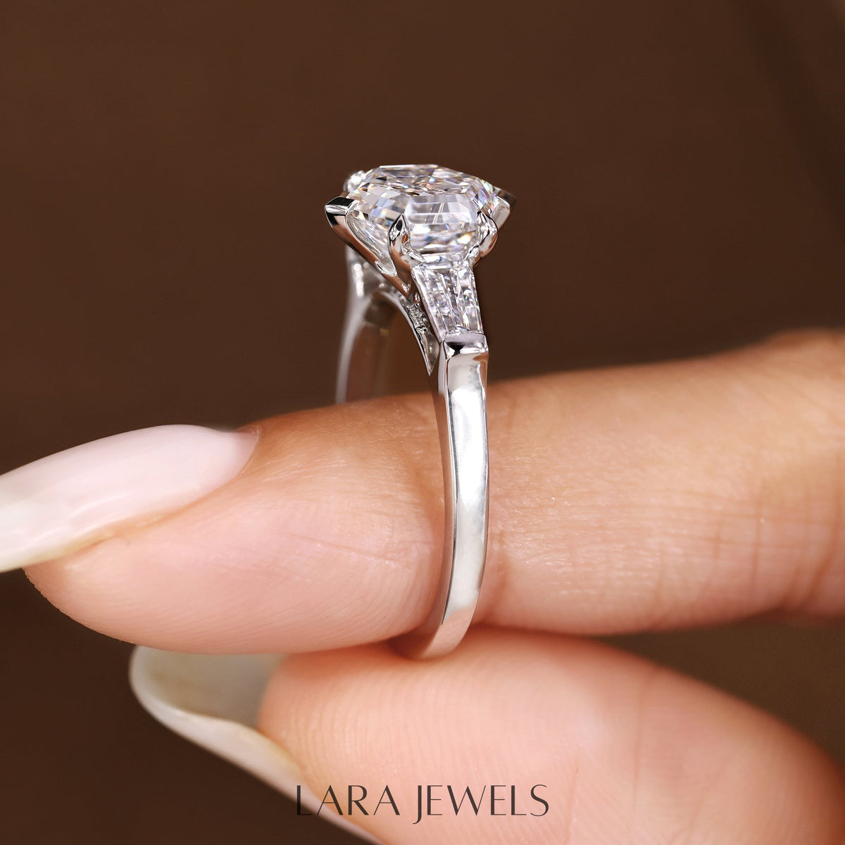 Lab grown baguette engagement ring in Lara Jewels setting, available in Silver. IGI certified, ethically sourced, handcrafted at Lara Jewels.